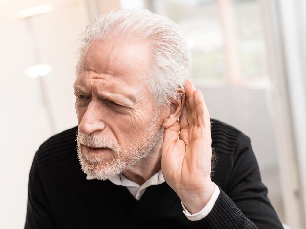 Patient learning about the types and causes of hearing loss at Advanced EARGEAR in Akron, OH